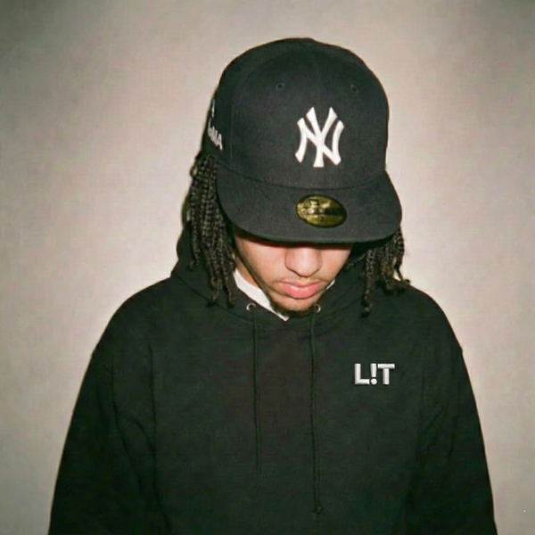 Model wearing a Ghostnote L!T hoodie — rapper streetwear