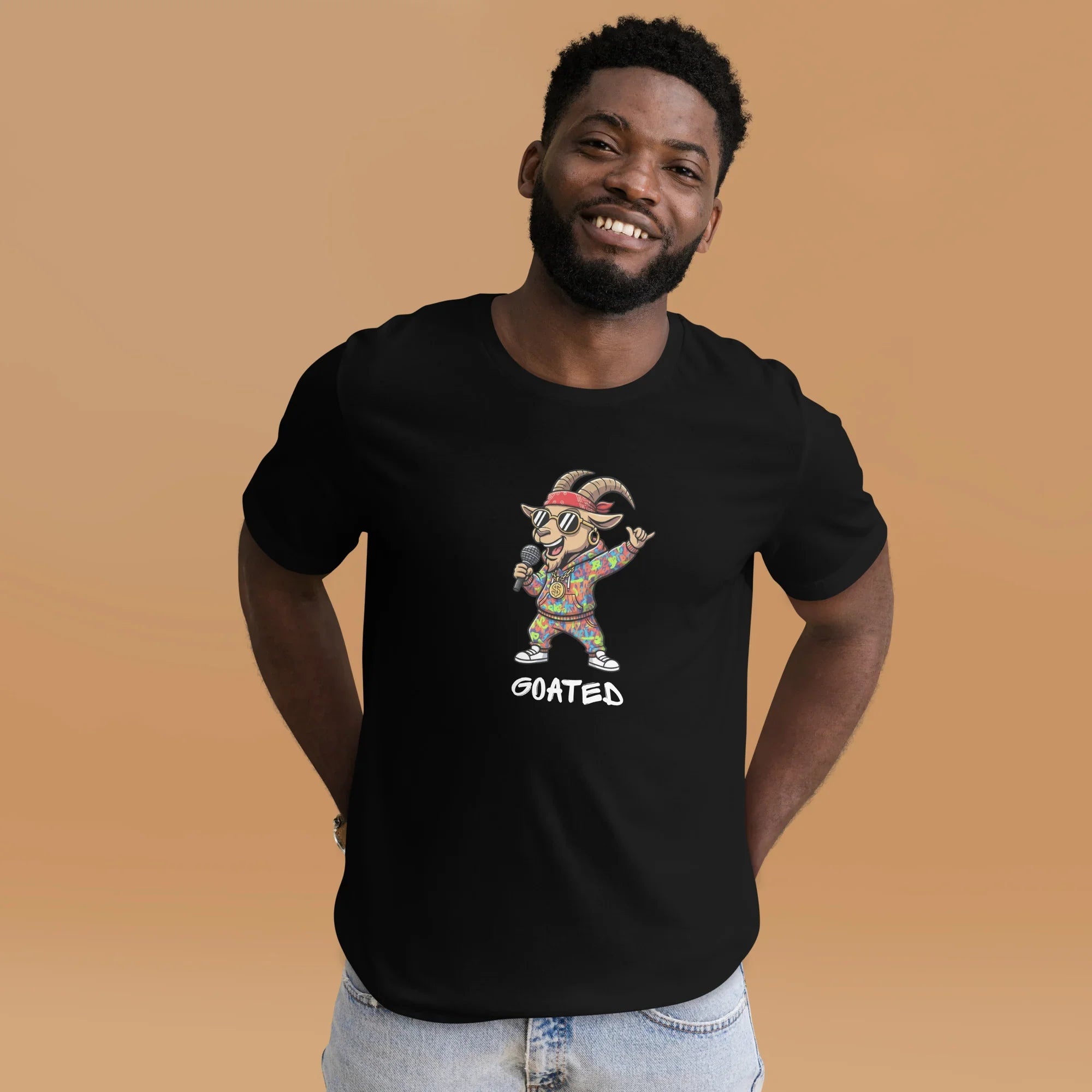 Black t-shirt with a cartoon goat wearing sunglasses and a bandana, and the word 'GOATED' on a black background wore by a man