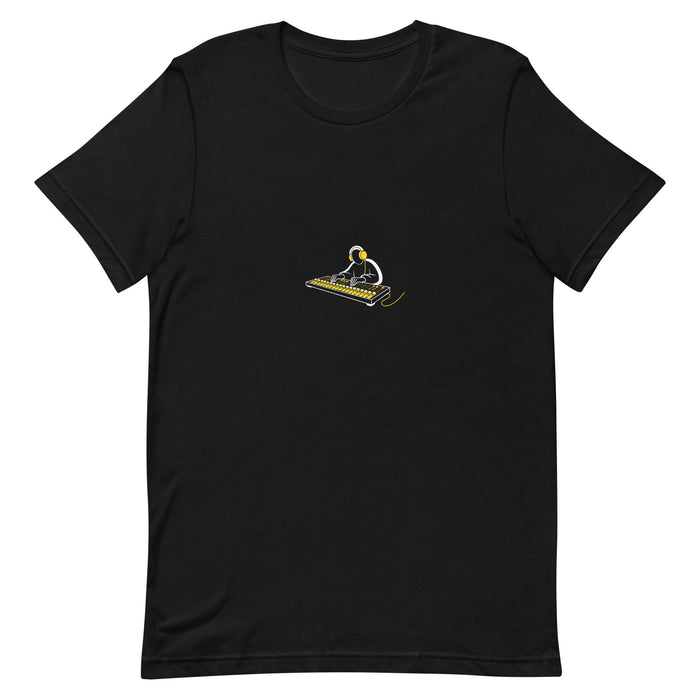 Black t-shirt with a white-and-yellow illustration of an audio engineer at a mixing board — Ghostnote streetwear tee, flat front