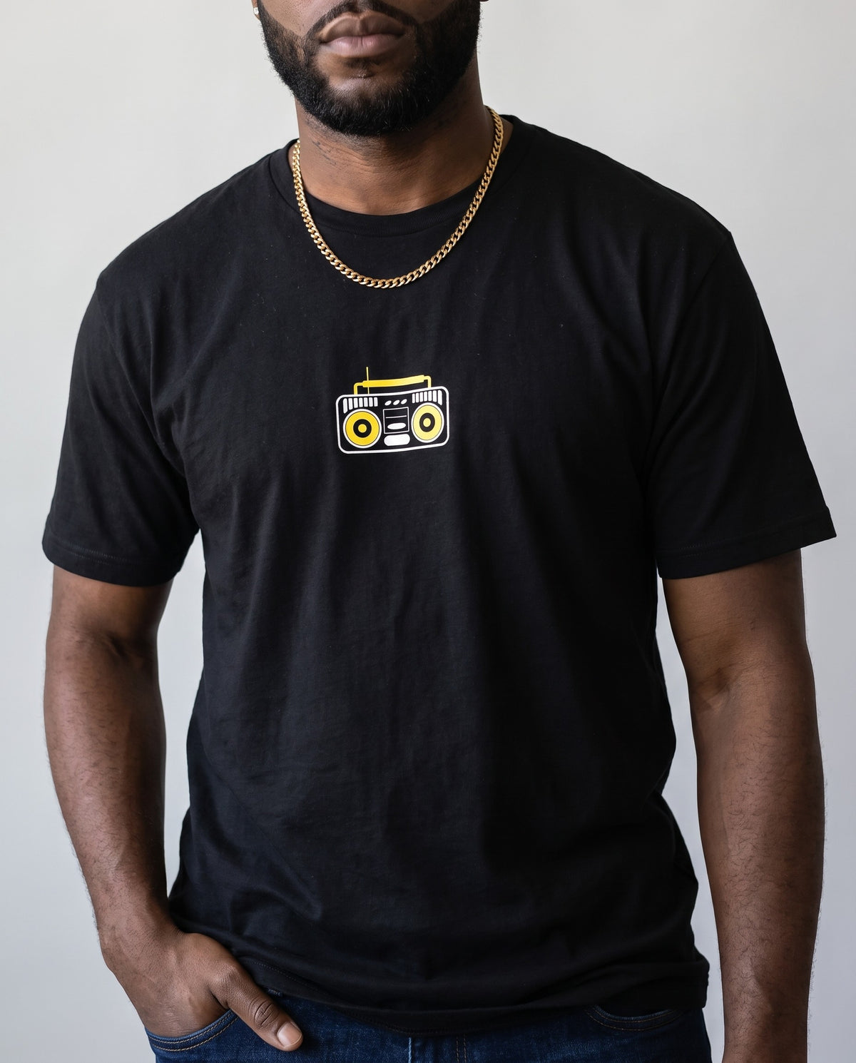Model wearing the Boombox t-shirt in Black, print close-up