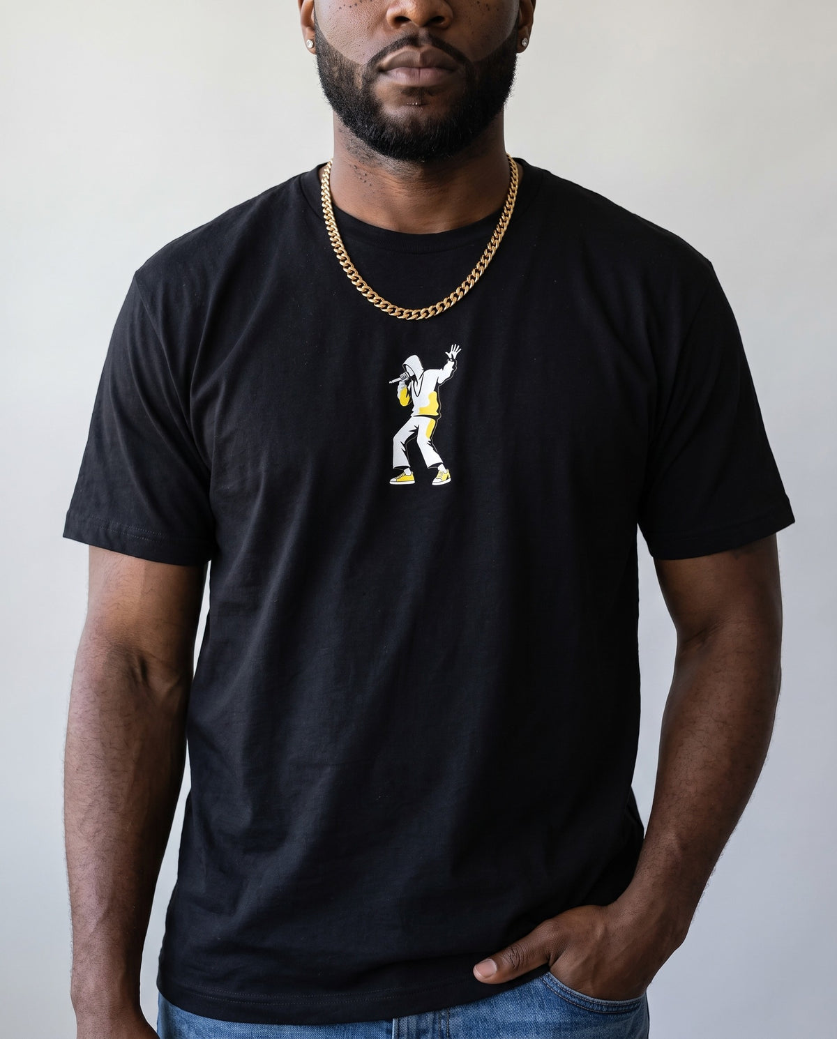 Model wearing the Center Stage t-shirt in Black, print close-up
