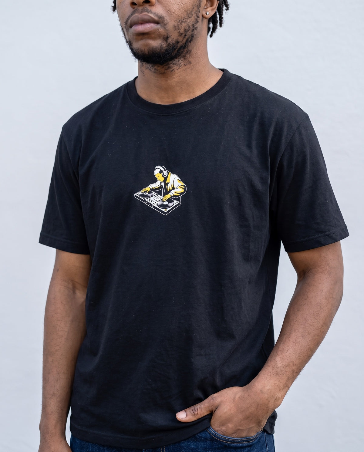 Model wearing the Cut & Scratch t-shirt in Black, print close-up