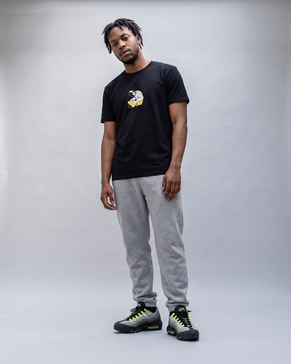Model wearing the MPC Fingers t-shirt in Black, full length