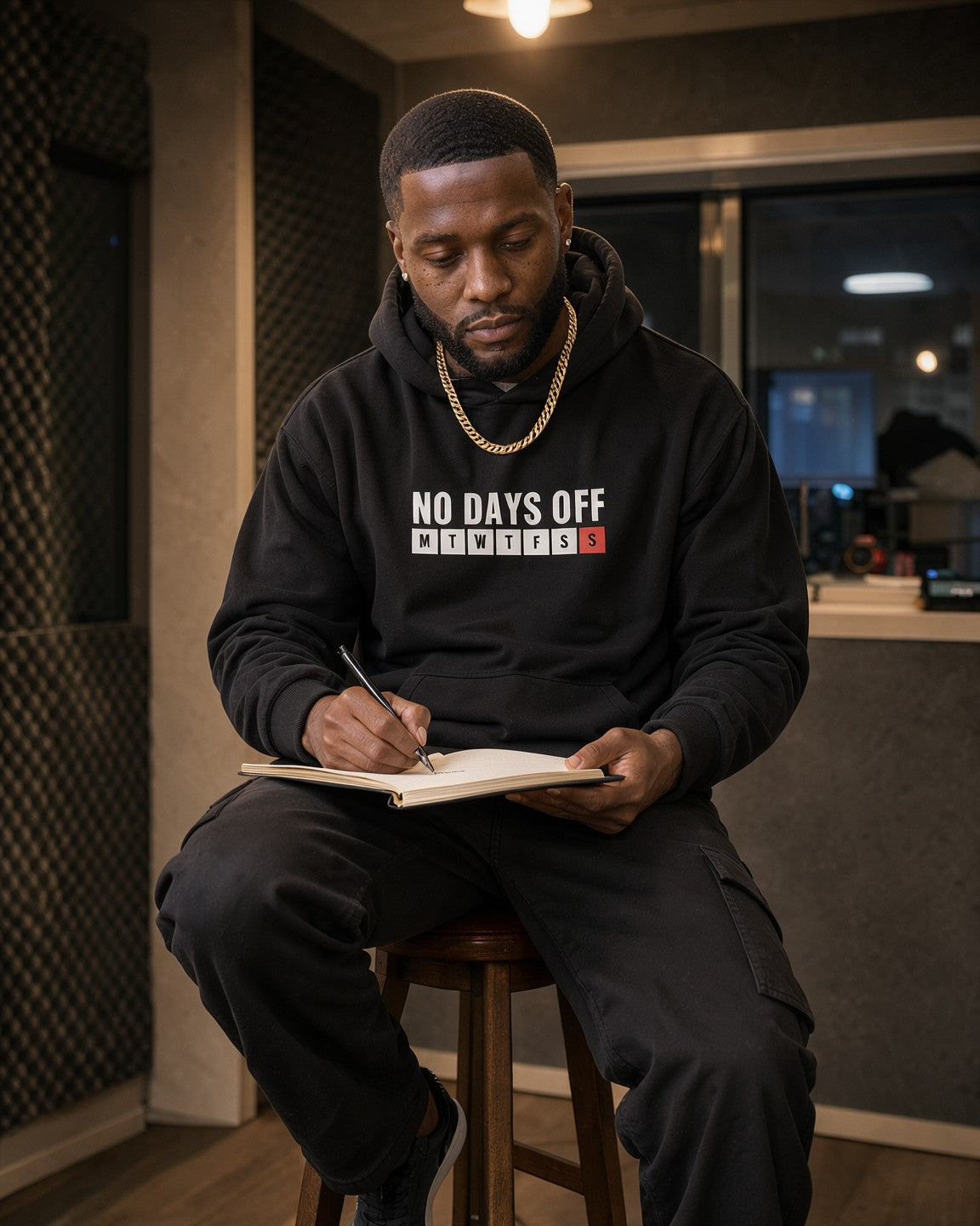 Model wearing the No Days Off Hoodie in Black