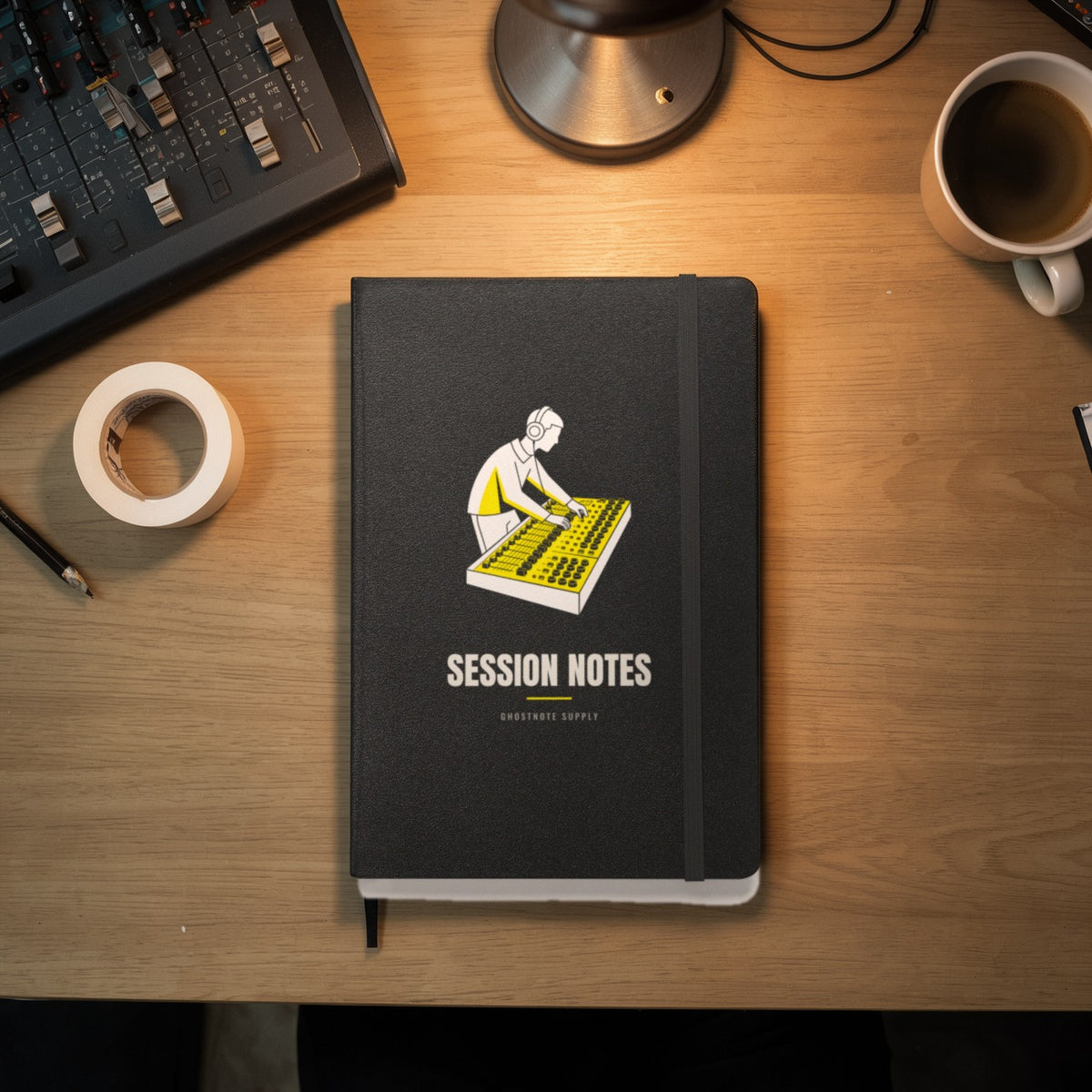 Session Notes Engineer Notebook on a home studio desk