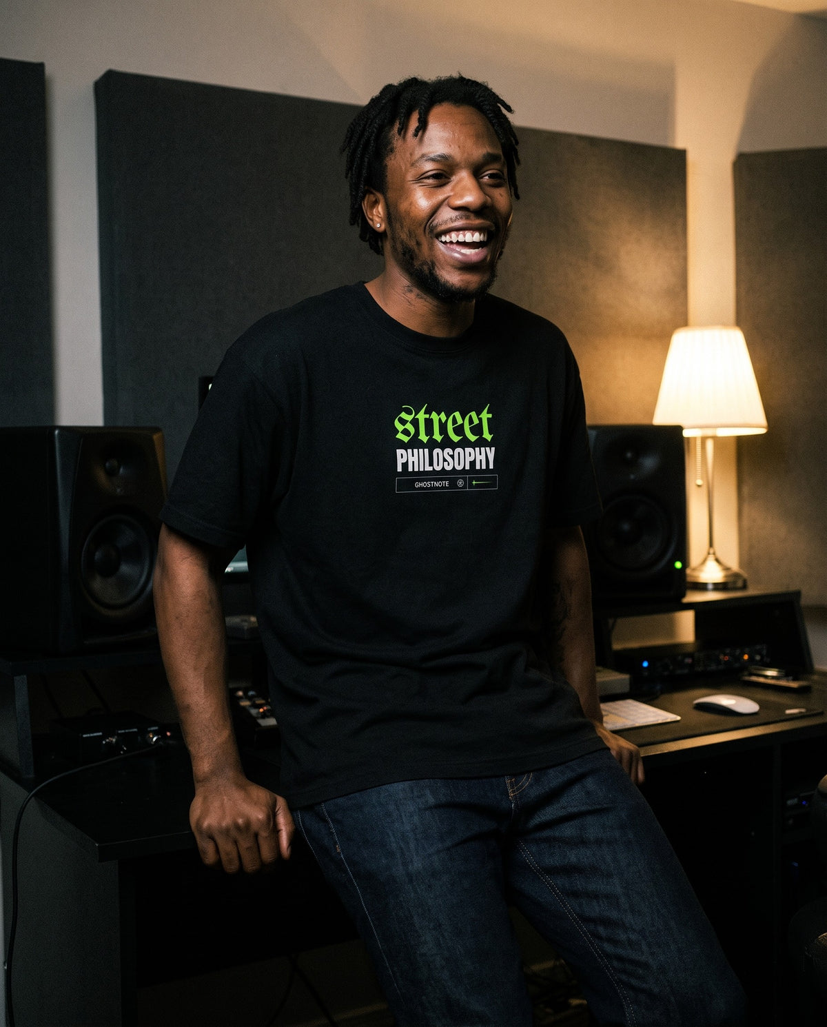 Model wearing the Street Philosophy t-shirt in Black, in a home studio