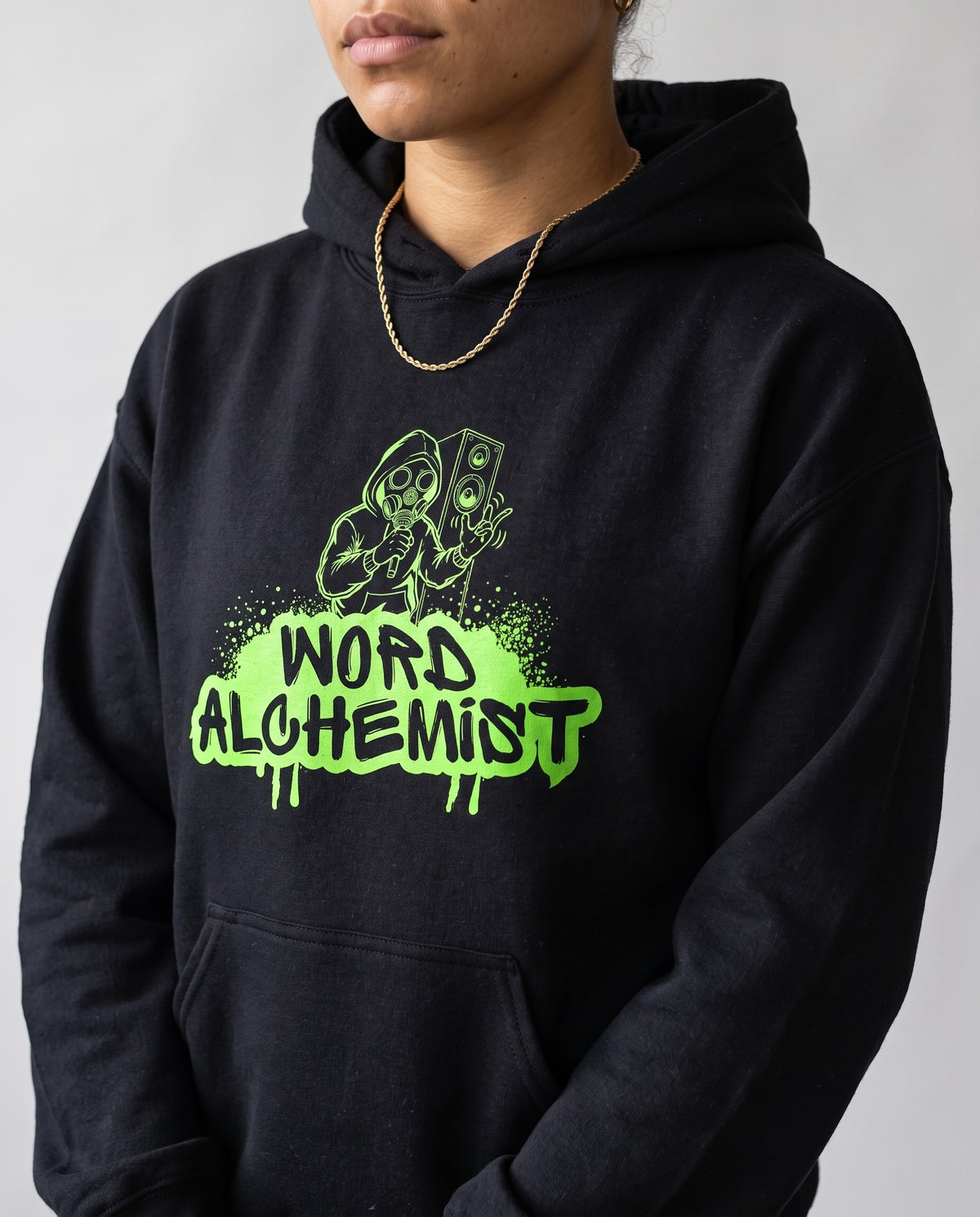 Model wearing the Word Alchemist hoodie in Black, print close-up