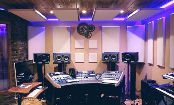 Professional studio control room with monitors and acoustic panels — gifts for audio engineers