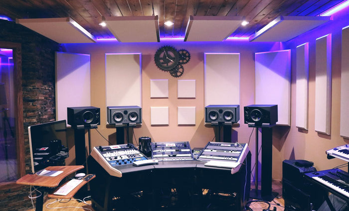 Professional studio control room with monitors and acoustic panels — gifts for audio engineers