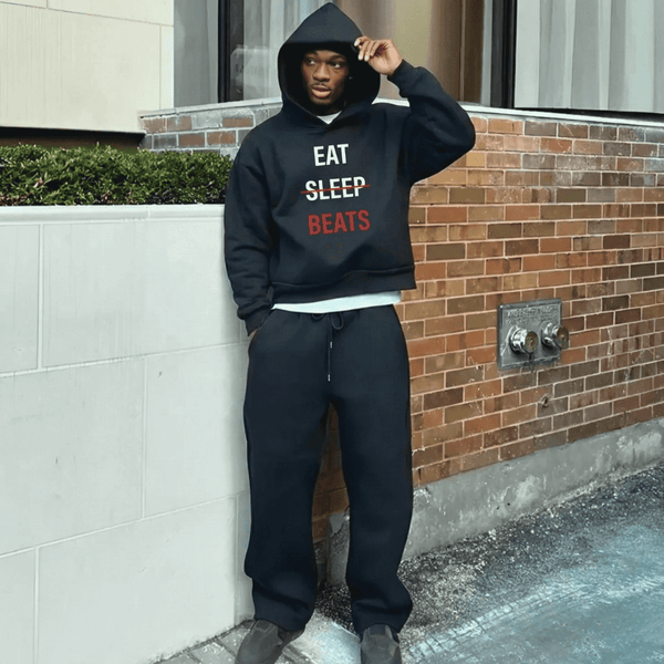 Streetwear model in a Ghostnote hoodie — history of hip hop fashion