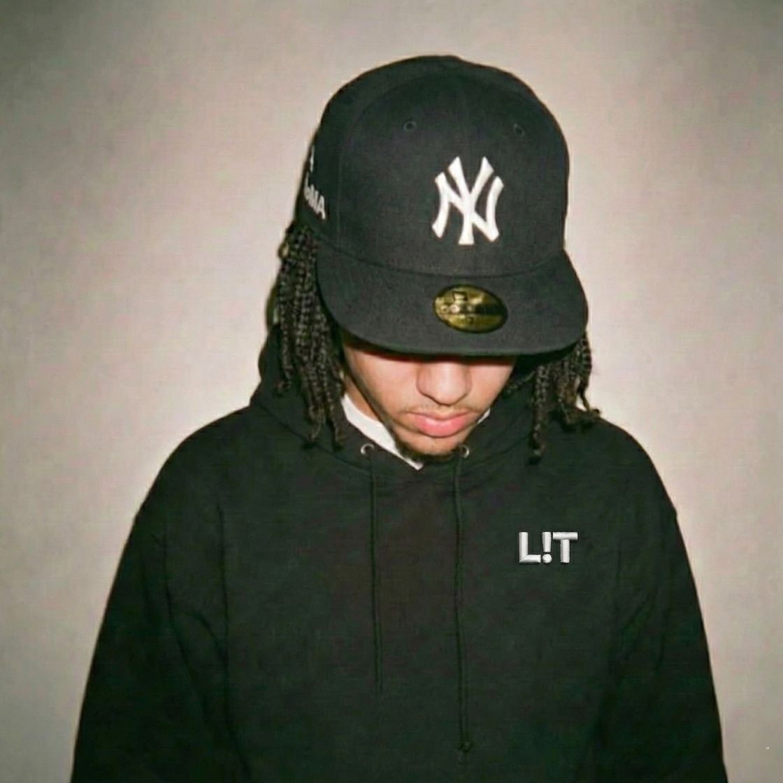 Model wearing a Ghostnote L!T hoodie — rapper streetwear