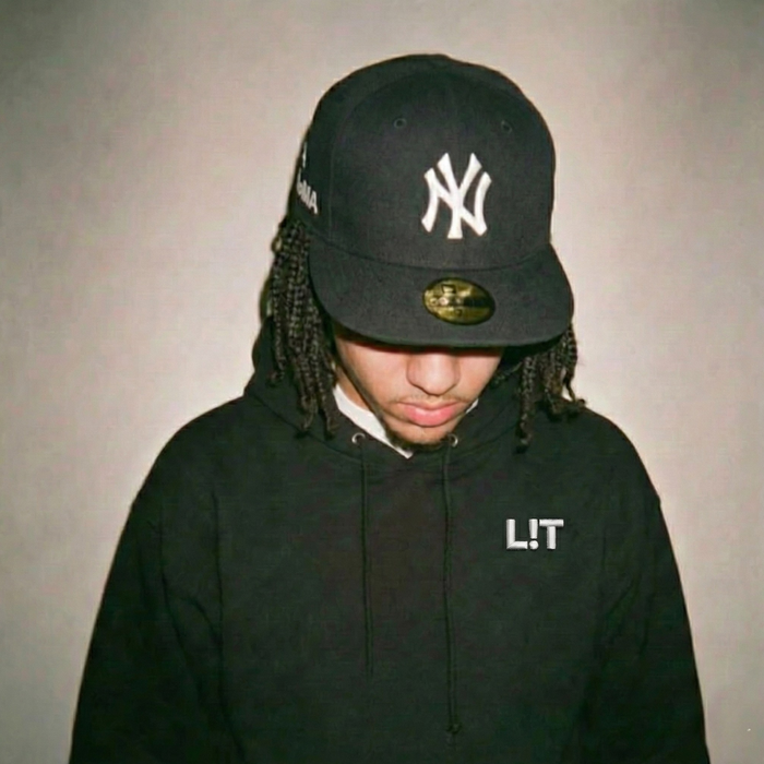Model wearing a Ghostnote L!T hoodie — rapper streetwear