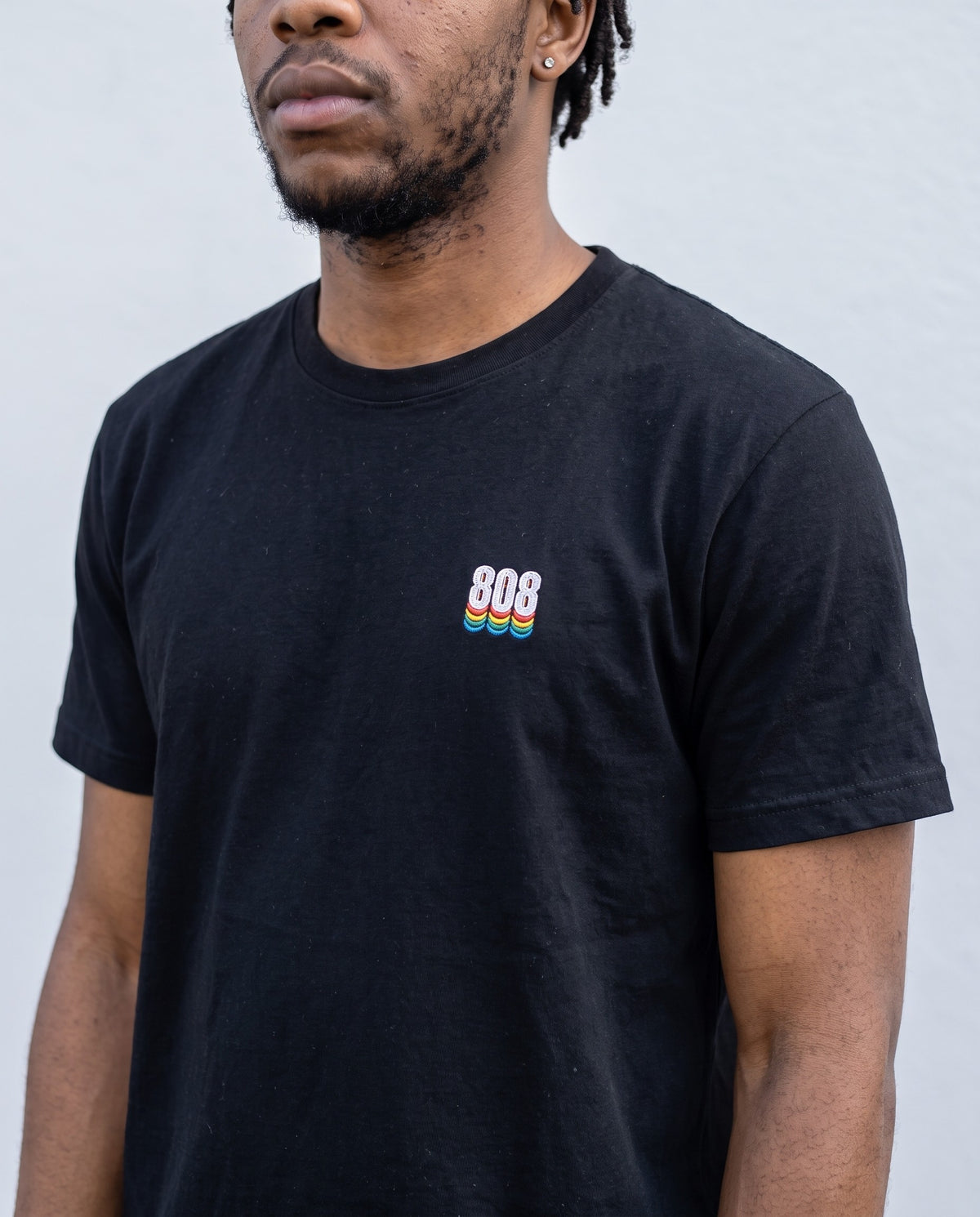 Model wearing the 808 t-shirt in Black, print close-up