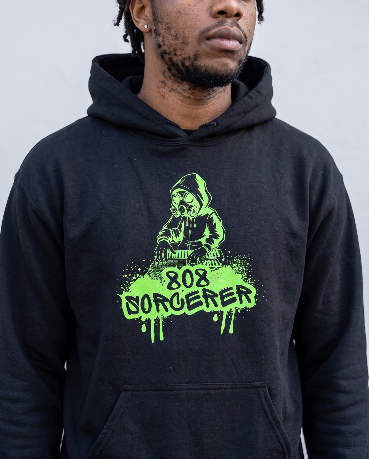 Model wearing the 808 Sorcerer hoodie in Black, print close-up