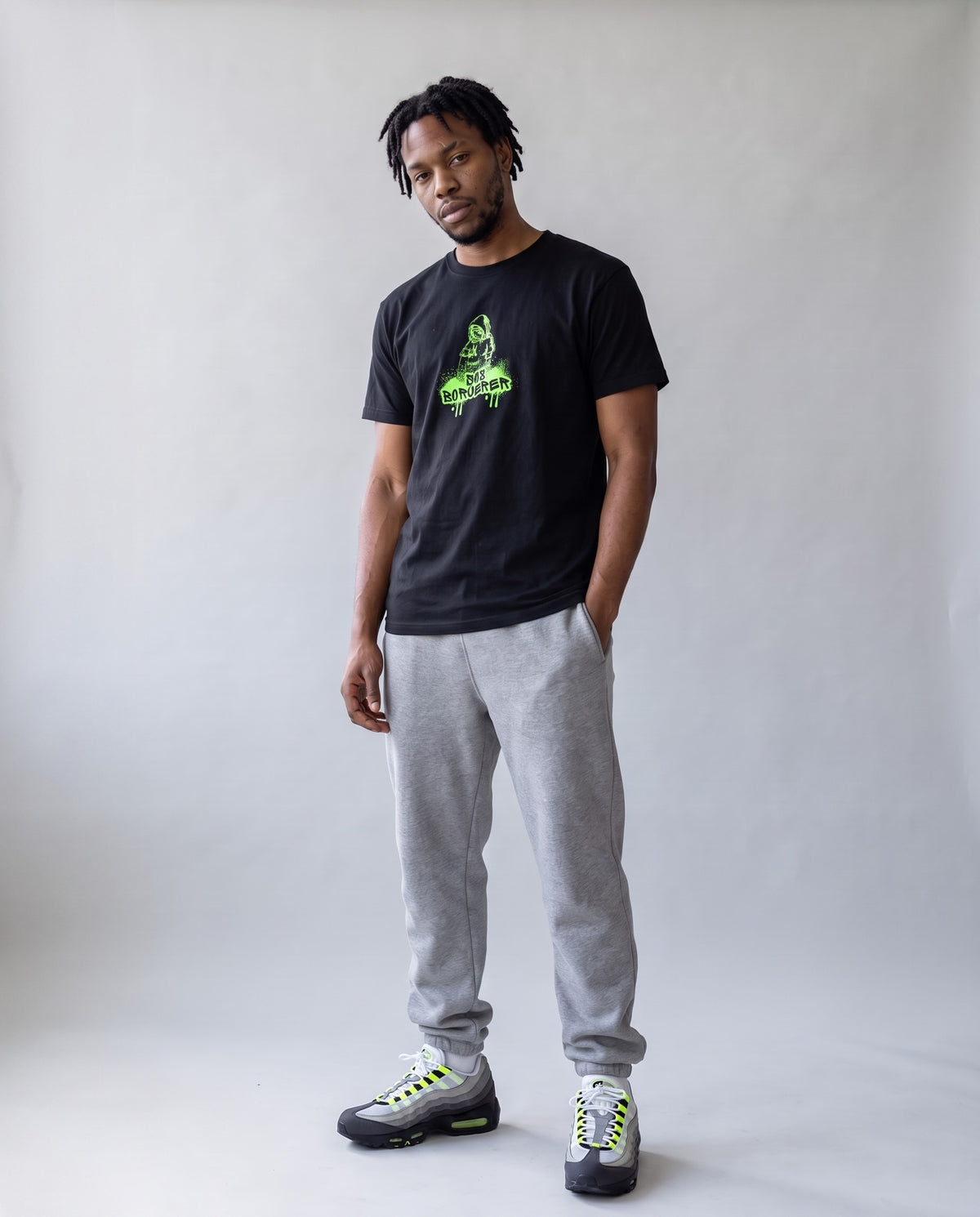 Model wearing the 808 Sorcerer t-shirt in Black, full length