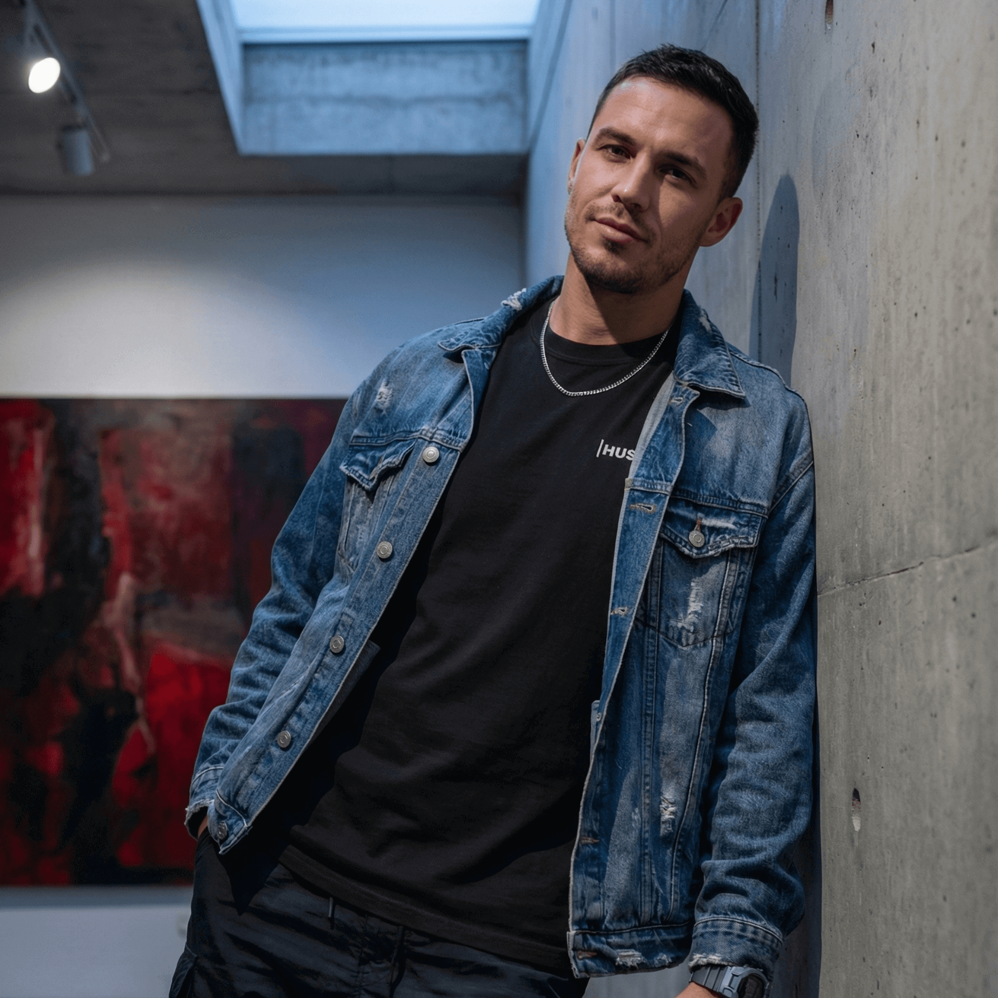 Hustle tshirt wore by a model for streetwear hip hop brand Ghostnote