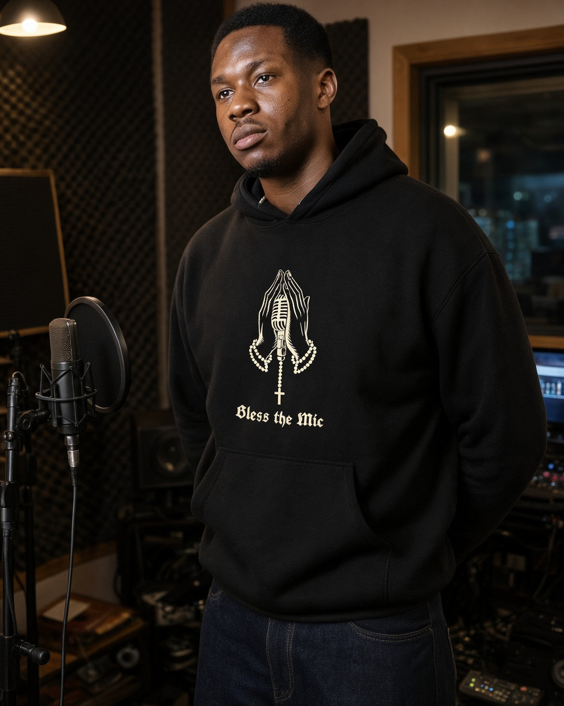 Model wearing the Bless the Mic Hoodie in Black