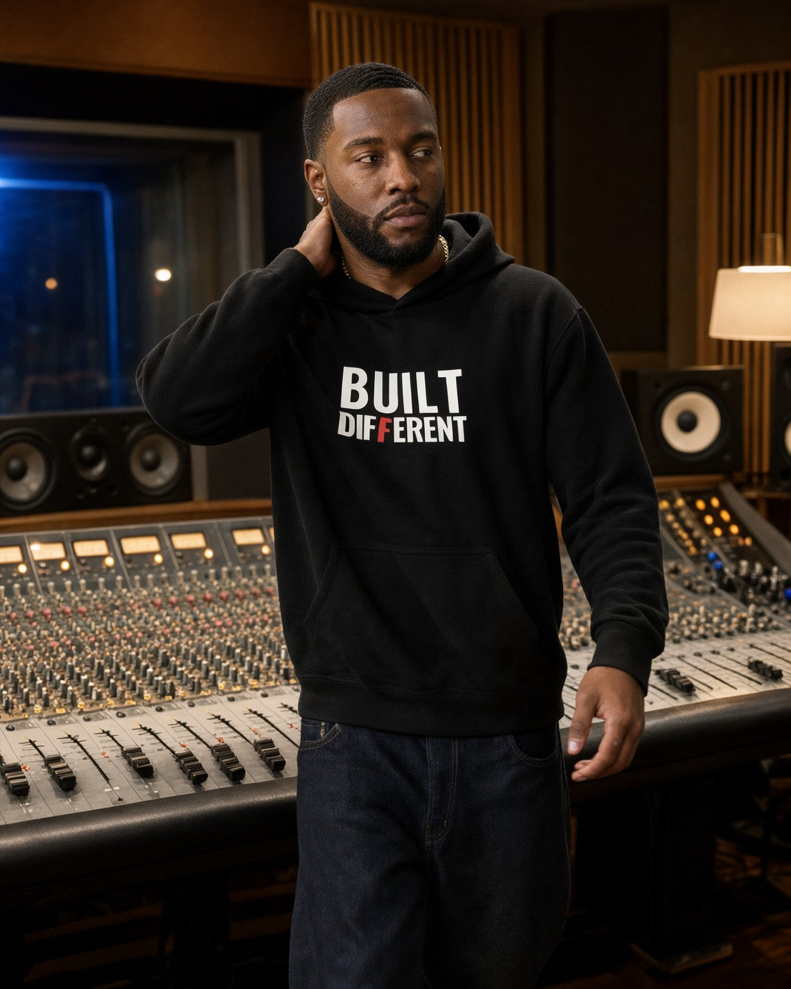 Model wearing the Built Different Hoodie in Black