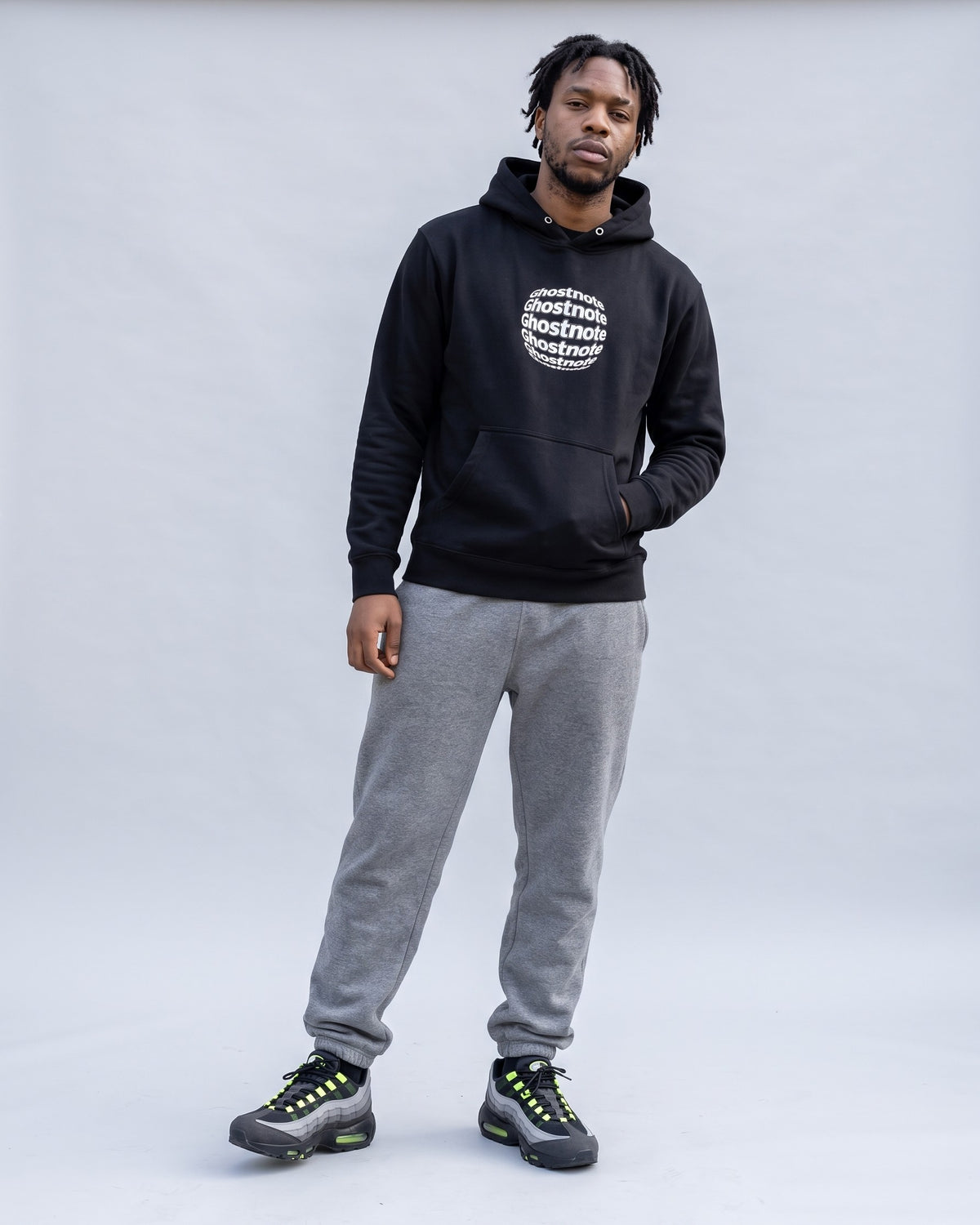 Model wearing the Ghostnote Alternative hoodie in Black, full length