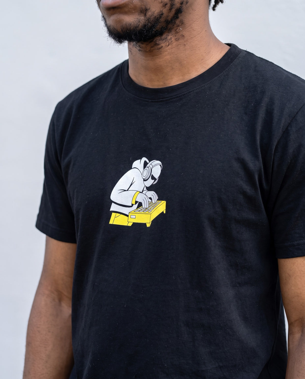 Model wearing the In The Zone t-shirt in Black, print close-up