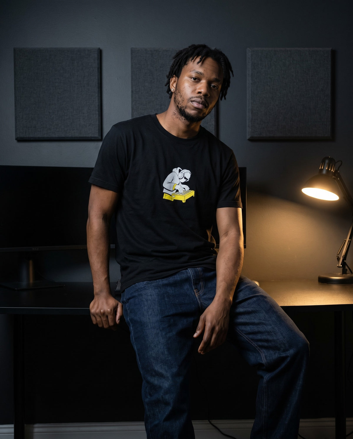 Model wearing the In The Zone t-shirt in Black, in a home studio