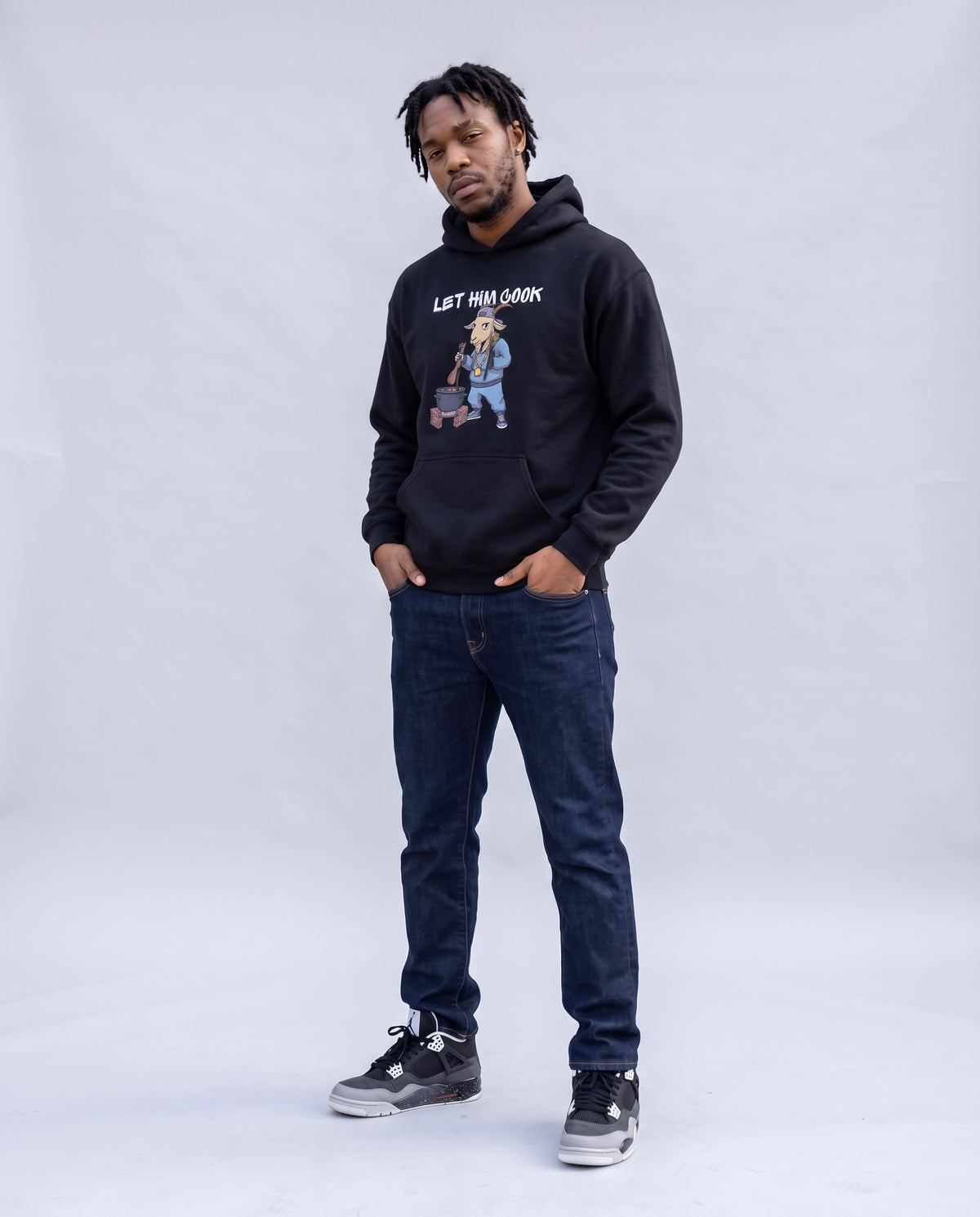 Model wearing the Let Him Cook hoodie in Black, full length