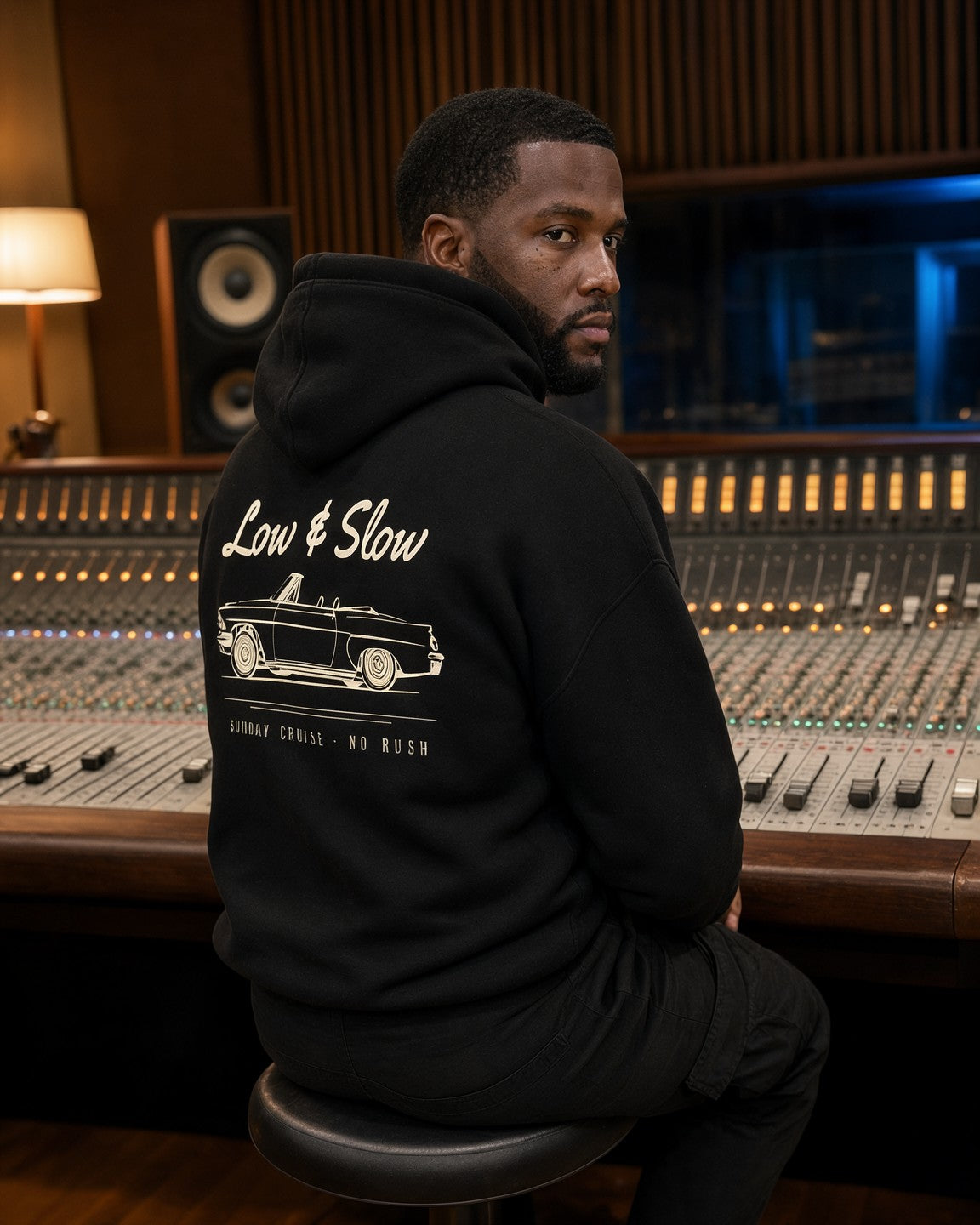 Model wearing the Low & Slow Hoodie in Black