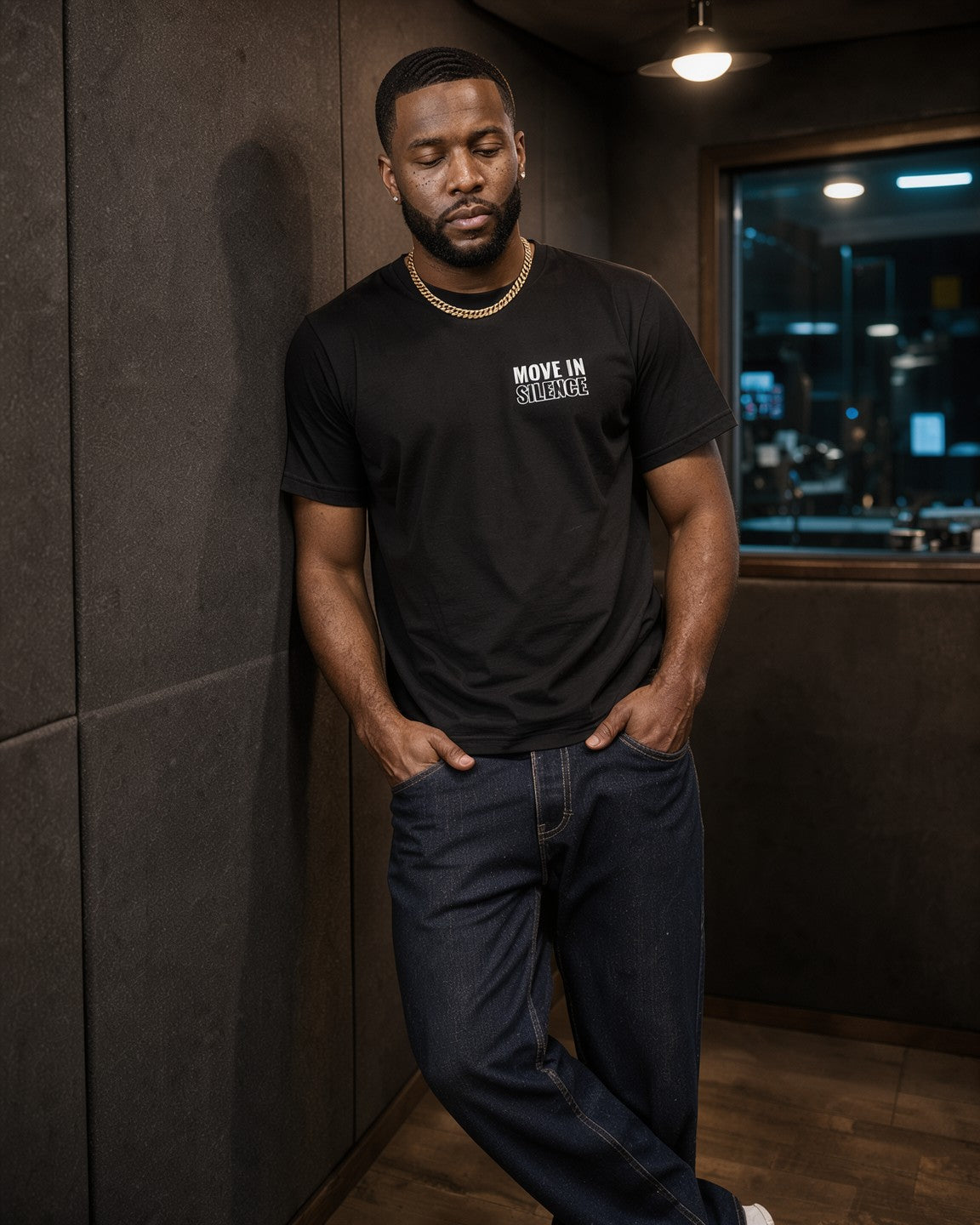 Model wearing the Move In Silence Tee in Black