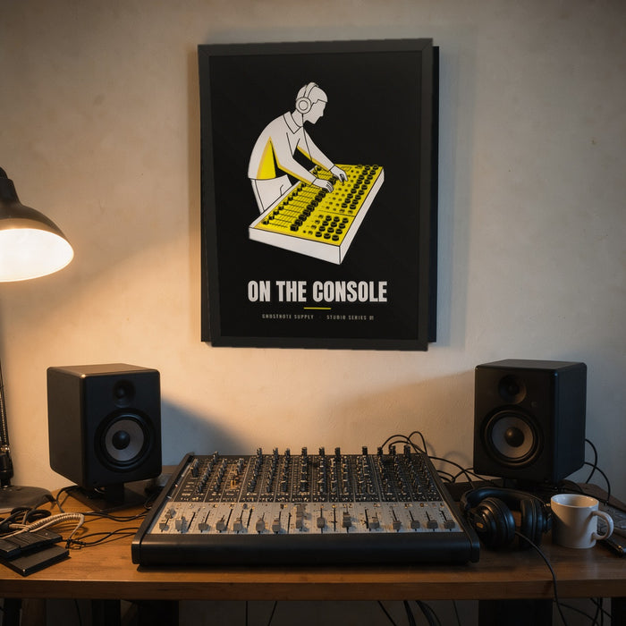 On The Console Studio Poster framed on a home studio wall above a mixing console