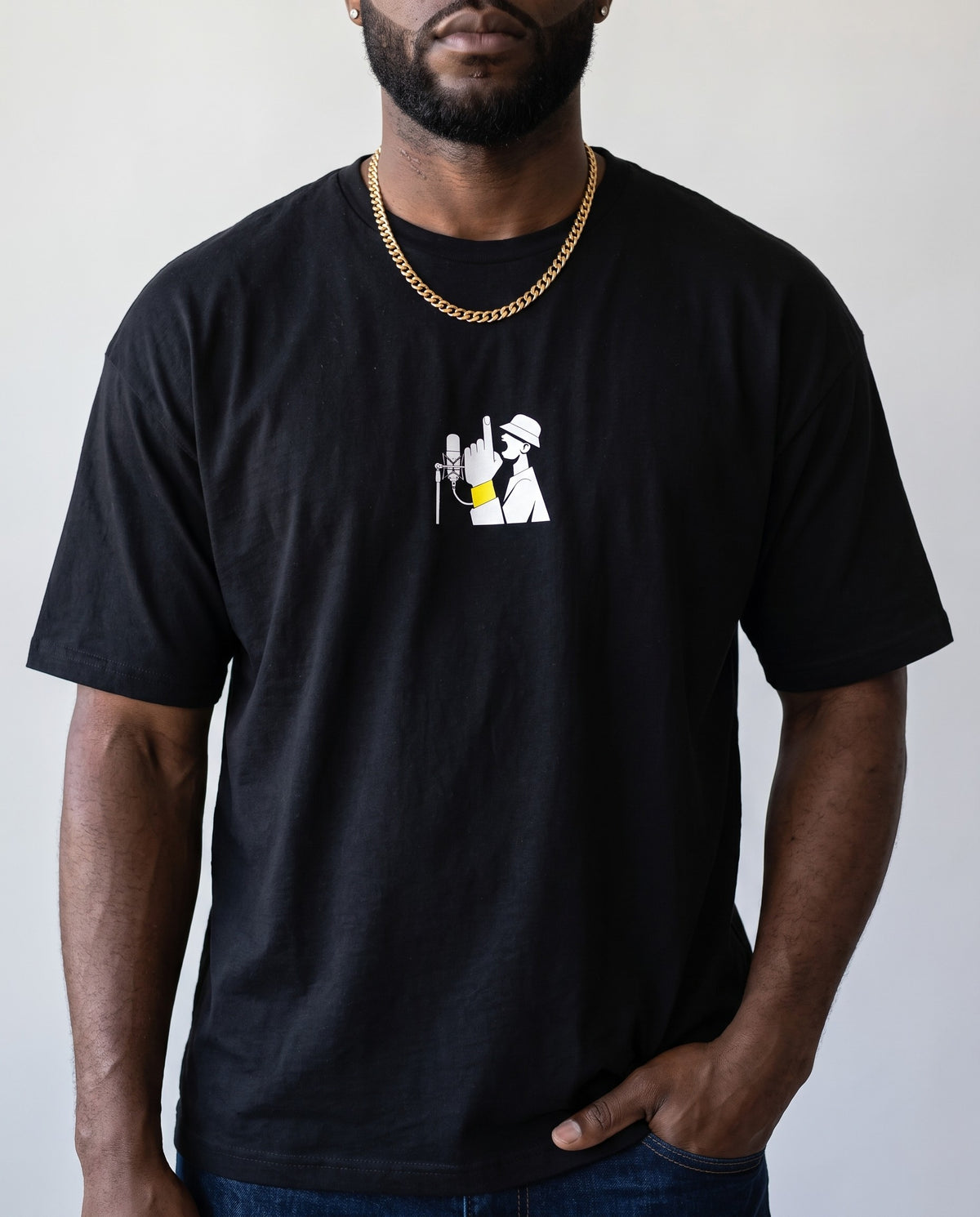 Model wearing the On The Mic t-shirt in Black, print close-up