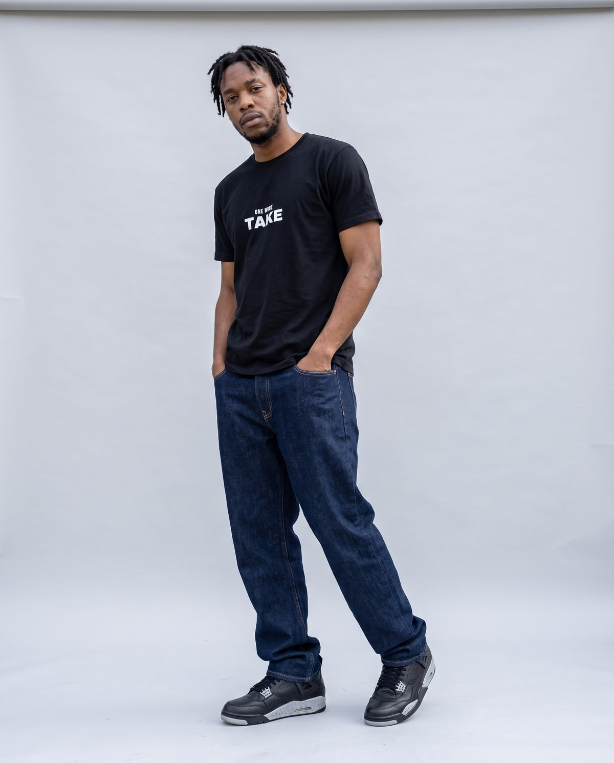 Model wearing the One More Take t-shirt in Black, full length