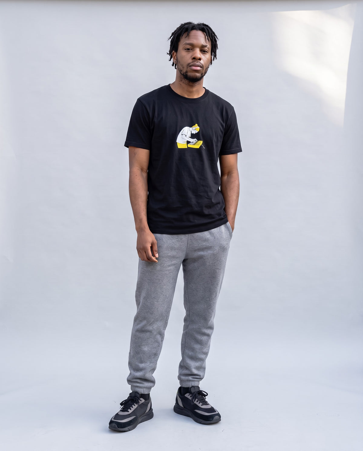 Model wearing the Pad Banger t-shirt in Black, full length
