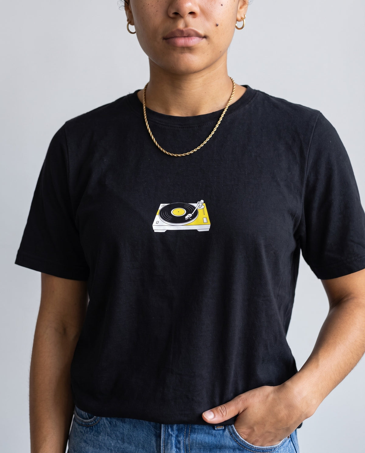 Model wearing the Spin That t-shirt in Black, print close-up