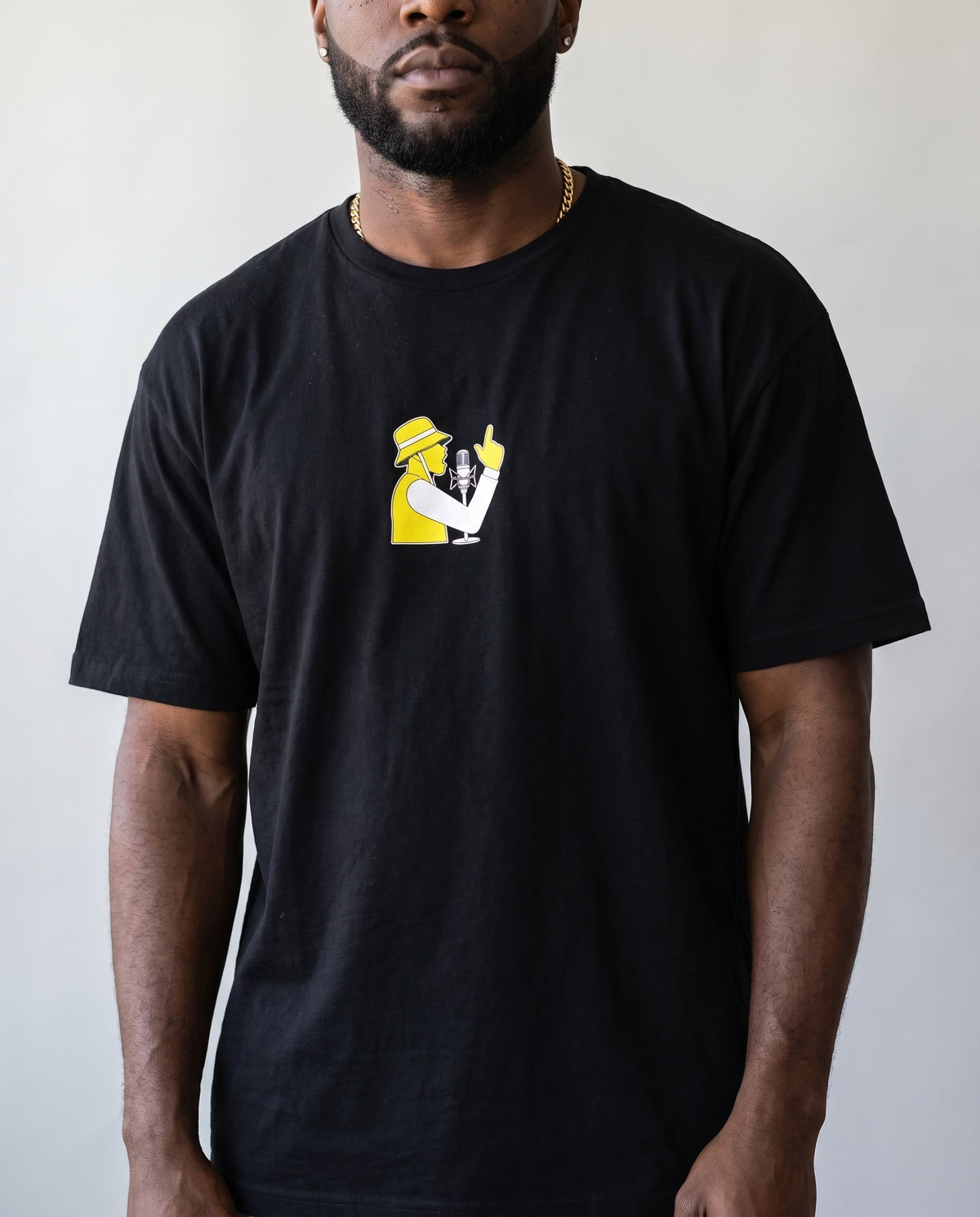 Model wearing the Spit Fire t-shirt in Black, print close-up